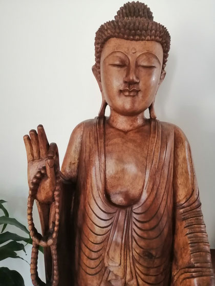 Bouddha de bois. Crédit photo A. Molina