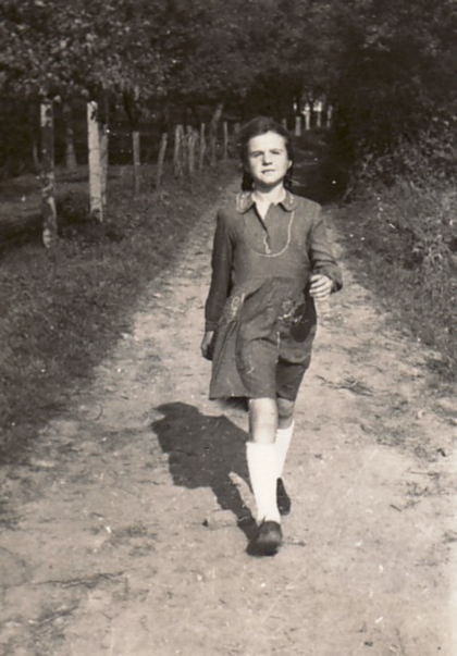 The young Bettina Heinen in the famine year of 1947 on the way from the Black House in Solingen to the nearby “artist garden” of the Heinen family