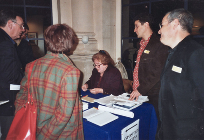 Bettina Heinen-Ayech signs autographs in the tapestry hall of the Paris City Hall on the occasion of her large exhibition