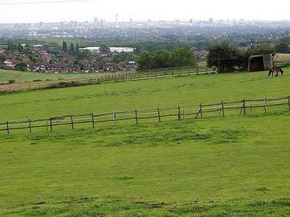 View towards Pheasey from Barr Beacon, on the horizon the City Centre. © Adrian Bailey and licensed for reuse under Creative Commons Licence: Attribution 2.0 UK: England & Wales. Geograph OS reference SP0696.