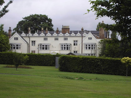 Pype Hayes Hall - west elevation. Evidence of ridge and furrow can be seen in the foreground.