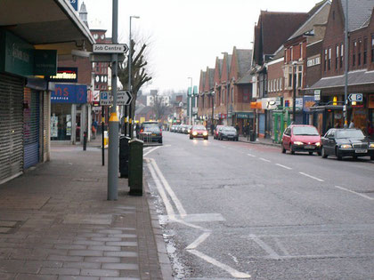 Kings Heath High Street looking north. Copyright Phil Champion and licensed for reuse under Creative Commons Licence: Attribution-Share Alike 2.0 Generic. Geograph OS reference SP0781.