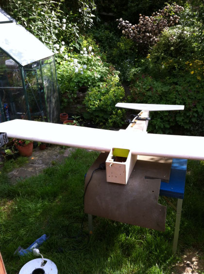 fitting the wing in the garden.