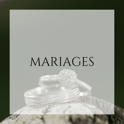 Photographie de deux alliances avec le texte "mariage".