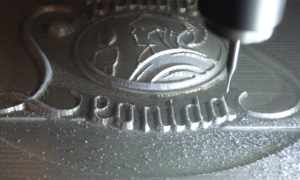 matrice aluminium crossconcept pour thermoformage du blason du chocolat Leonidas 