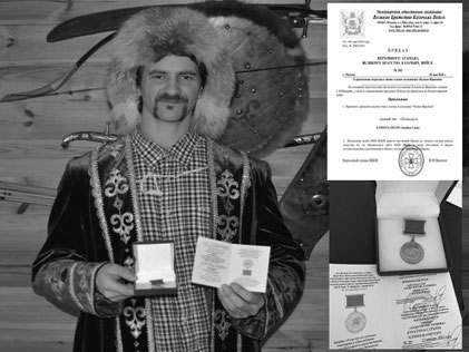 John C avec la préservation du bushcraft et savoirs-faire ancestraux bashkirs fut décoré par le grand kurultaï bashkir en 2021