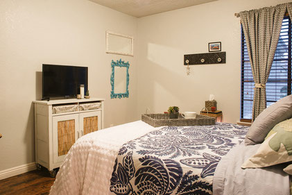 Early photo of the TIKI RETREAT. The whole room got a facelift recently including the sad little TV cart. Pssst: It doesn't look like that anymore.