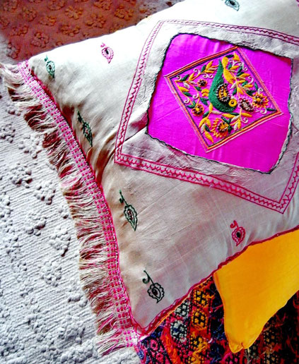 Sand-coloured, Indian, handloom, Rajastani- silk, cushion cover with embroiidered, green/yelllow parrot & leaf design on bright-pink panel, & colourful hand-stiching throughout