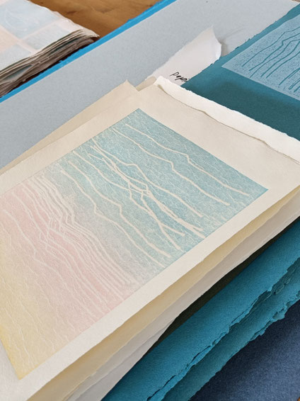 GLOWING LAND. 2024, iris & relief print on handmade paper by John Gerard, printed with support by Udo Haufe, Grafikwerkstatt Dresden
