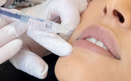 close up of botox injection in womans face