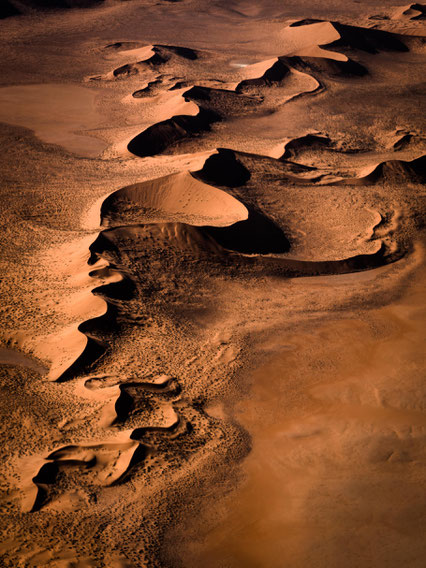 Red sand dunes in the areas of Sossusvlei - bird`s eye view, scenic flight - Namib Desert Namibia