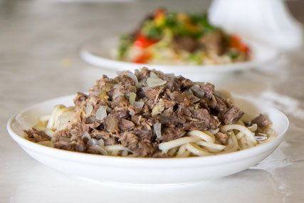 Photo of traditional Kyrgyz food. This one is called Beshbarmak.