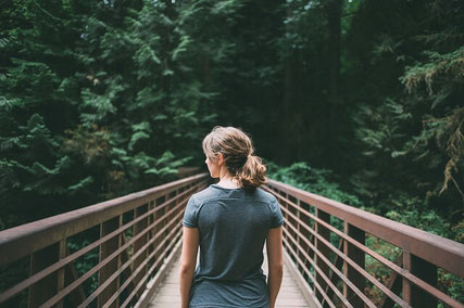 Girl on bridge.