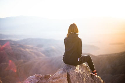 Woman on mountain.