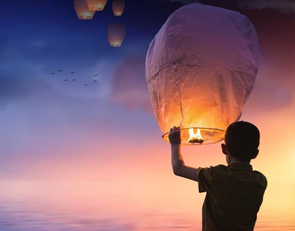 Child with hot air balloon.