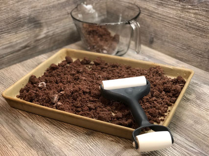 Großer Ofenzauberer mit Kuchenteig belegt