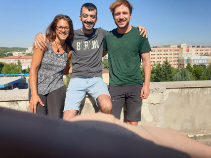 Viviane, our couchsurfing host Baris and Bastian on the rooftop of startup OTTO in Gaziantep, Turkey