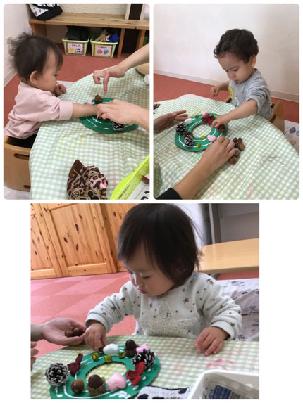 椿の実やまつぼっくり、どんぐり等好きなものを選びました。様々な形の木の実を手に取って楽しそうに選んでいました。たくさん並べたり、バランスよく並べたりしてとても素敵なリースが出来上がりました！