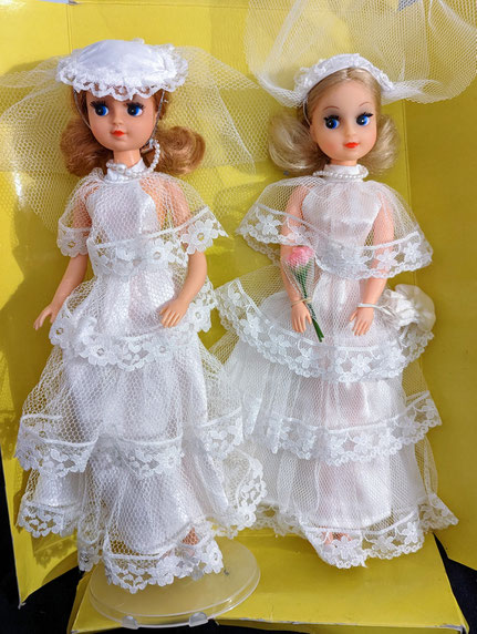 Wedding Fleur first edition left and second edition right. Please note the different lace pattern on the dress.