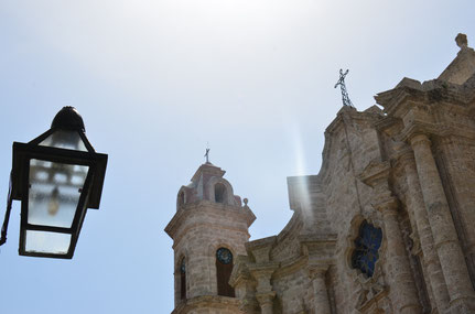 Havana, noon stroll in La Vieja Habana; church, blue skies