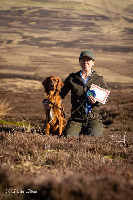 Kim Brown with her young dog Coldcoats Rum after winning the Puppy Stake. 
