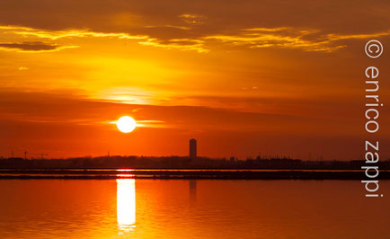 Alba alle Saline di Cervia, rivolti verso Cesenatico.