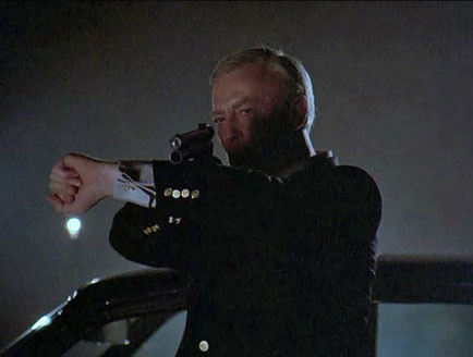 Edward Woodward as Robert McCall in The Equalizer takes down a crooked cop in the first season episode "Lady Cop"