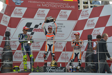 MotoGP - Das Podium 2014 in Valencia mit Valentino Rossi, Marc Marquez und Dani Pedrosa.