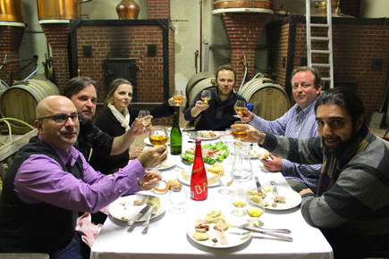 Ryan Maloney, Brian Cisc, Christine Cooney, Jean-Roger Groult, Bret Pontoni, and Nima Ansari enjoy a break in their still side meal, hosted by Calvados Roger Groult.