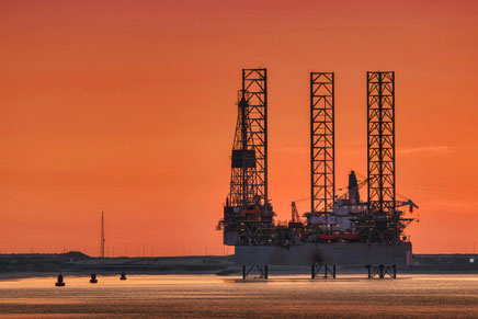 Offshore oil rig at sunset - Offshore platform engineering and jacking system services