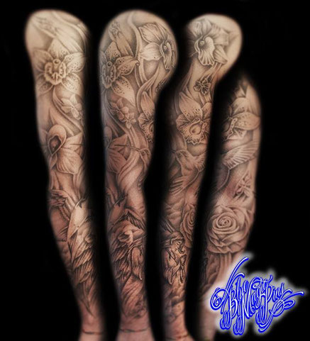 Blue Magic Pins fully custom design with orchids and leafs floating through the arm represents a memory on his grandmother that used to love this flowers :) Genk Belgium tattoo shop