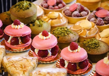 French pastries on display on a confectionery stall - Copyright Elena Dijour