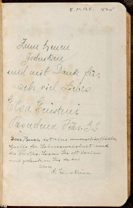 A Bible with an inscription from Albert Einstein saying that the holy text 'is a great source of wisdom and consolation and should be read frequently'.