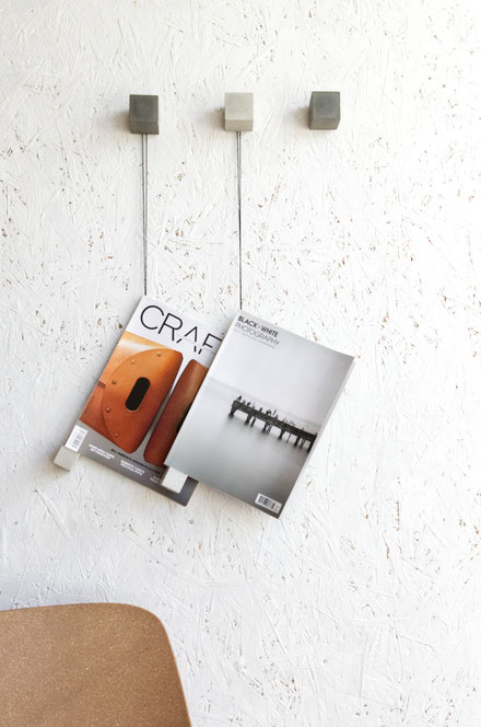 A modern concrete and backer twine magazine wall display diy  