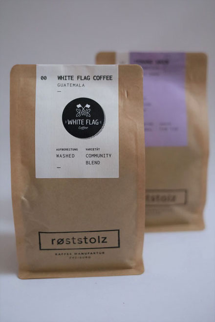 Link zu den Kaffeesorten im Shop. Abbildung zeigt Kaffeeverpackung.