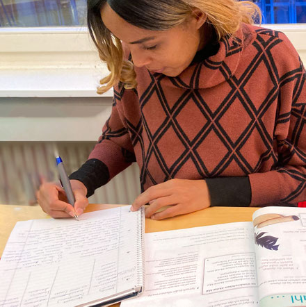 Student learning German during a private German lesson inHamburg