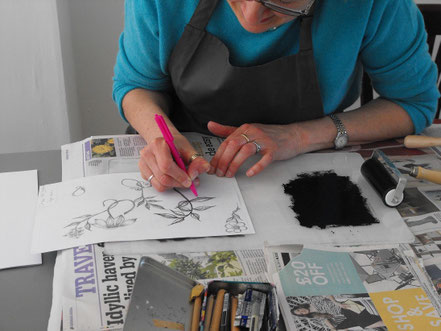 Designing an image at a drypoint etching printmaking workshop