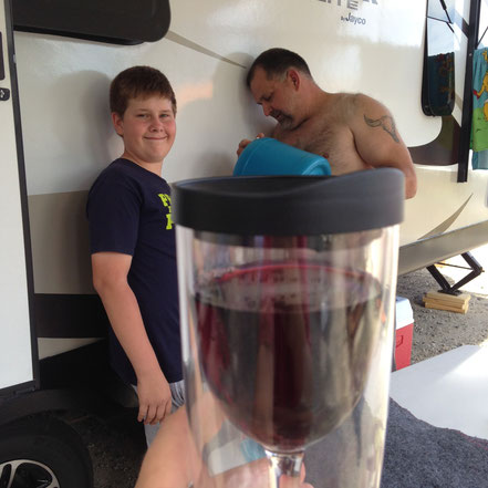 Camping with a new travel trailer (and wine!) in August.