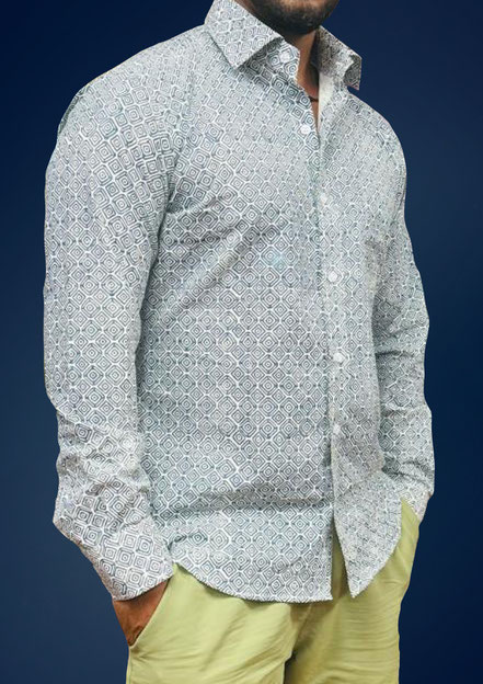 A tailored men's shirt made from exquisite blockprinting fabrics, showcasing intricate patterns and vibrant colors. We offer a wide range of blockprinting fabrics for men, tailored to your perfect size. Visit us in Connaught Lane, Delhi.