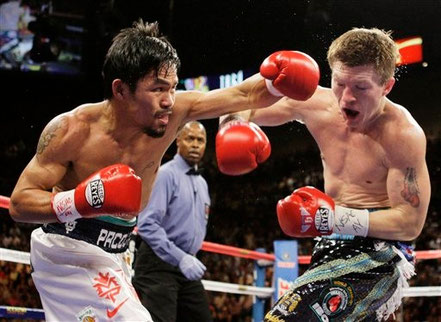 © AP Photo/ Jae C. Hong. Quelle: http://www.odt.co.nz/sport/boxing/53933/boxing-pacquiao-destroys-hatton-two-rounds