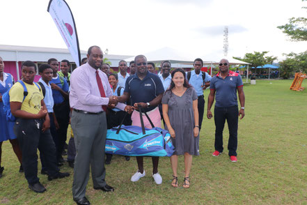 Cricket Kindness Ambassador, Sir Richie Richardson and founder, Tamara Lowe present equipment to Principal Ashworth Azille at Clare Hall Secondary in ANTIGUA during the inaugural Cricket Kindness Mission in 2017! 