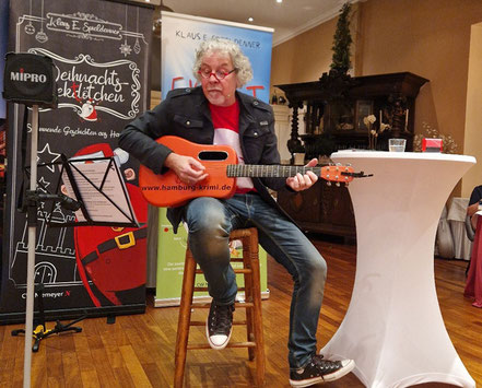 Herr Spieldenner mit Guitarre