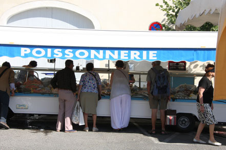 Bild: Markttag in L´Isle-sur-la-Sorgue