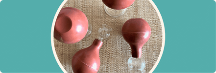 Schröpfköpfe mit Ball  