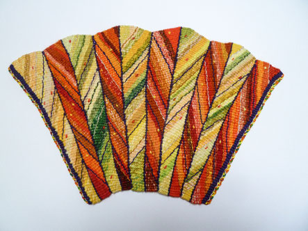Pulled warp and shaped tapestry