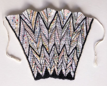 Pulled warp and shaped tapestry fan 