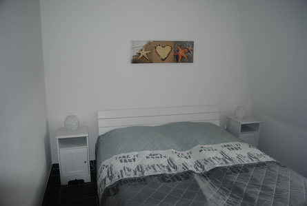 Schlafzimmer Ferienwohnung FeWo Wattlooper Norddeich Norden