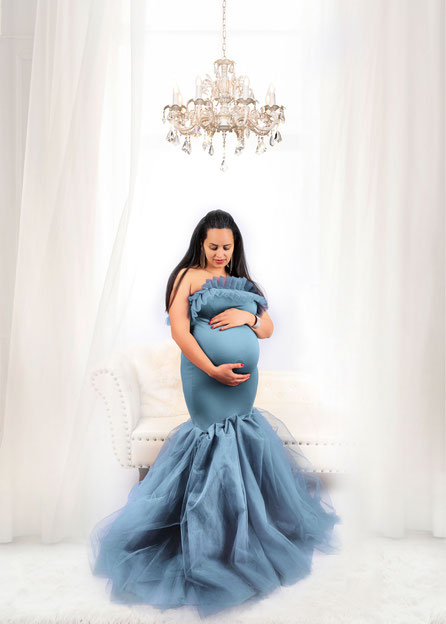 maternity shoot in blue dress