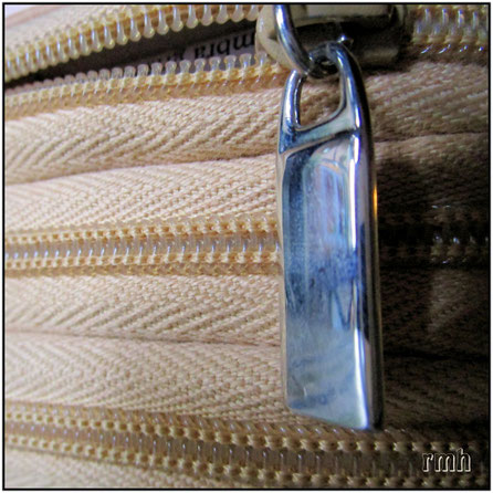 purse with zippers