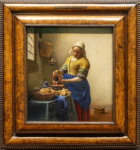 Johannes Vermeer painting The Milkmaid